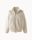 The Gstaad Bomber in Cream — angle